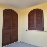 Installazione di infissi in alluminio a taglio termico ad alta efficienza energetica, progettati e montati a Copertino da Copertininfissi.